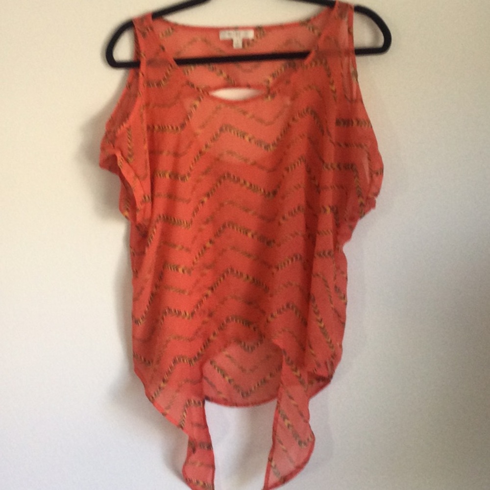 Sheer cold shoulder shirt.